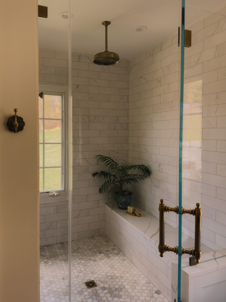 shower with marble tile